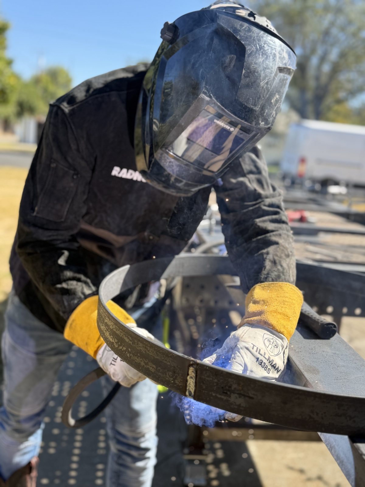 David Gayheart closing a rolled ring weld while the special inspector witnesses
